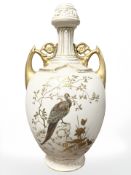 A Royal Worcester gilt and ivory twin-handled urn-shaped vase, shape 1200,