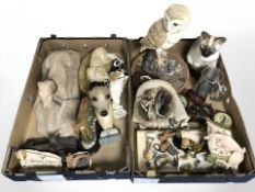 A collection of dog and other animal ornaments, figures,