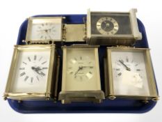 Five various brass carriage timepieces.