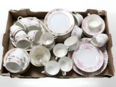 An Aynsley part tea and dinner service decorated with roses and a further antique part tea and