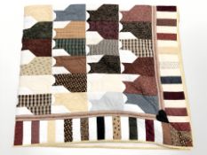 A patchwork quilt decorated with cat silhouettes, 180 cm x 200 cm.