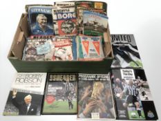 A quantity of football matchday programmes, Newcastle United related books, etc,