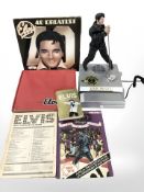 A group of Elvis collectibles including figurine, ephemera, etc.