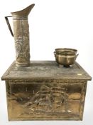 An embossed brass coal box,