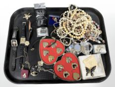 A collection of costume bead necklaces, brooches,