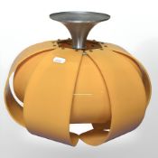 An orange plastic floral ceiling light shade, diameter 31 cm.