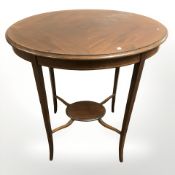 An Edwardian inlaid mahogany oval occasional table, width 65 cm.