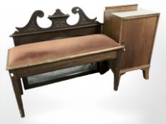 A piano stool, a bedside cabinet and a dressing table mirror back.