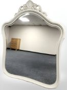 A reproduction painted wall mirror,