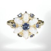 A 14ct gold opal and sapphire cluster ring, size S½ CONDITION REPORT: 3.