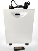 A Rel Acoustics sub-base speaker system, with remote and lead.