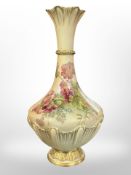 A Royal Worcester vase printed and painted with flowers on blush ground, 27cm high.