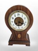 An Edwardian mahogany and satin wood inlaid balloon mantel clock,