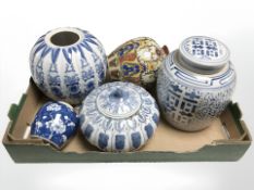 Two reproduction Chinese blue and white porcelain pumpkin jars, a further ginger jar and two others.