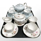 A Royal Crown Derby Derby Posies tea for two, and an Aynsley tea for two.