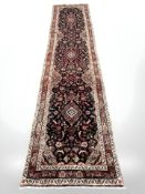 A Hamadan runner, North-West Iran, 407 cm x 98 cm.