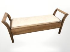 A mahogany storage duet stool,