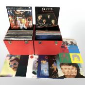 Two cases of vinyl LP records including Michael Jackson, The Carpenters, Queen, Barry Manilow, ABBA,