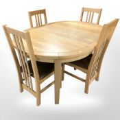 A contemporary oak extending oval dining table, with leaf, 160 cm L x 115 cm W x 76 cm H,