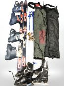 A pair of Atomic Compact TL skis, poles, two pairs of boots, outdoor clothing,