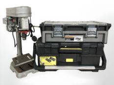 A Wickes pillar drill and two tool boxes.
