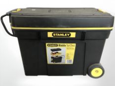 A Stanley mobile tool chest and contents.