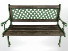 A Berkeley Forge painted cast iron and teak garden bench,