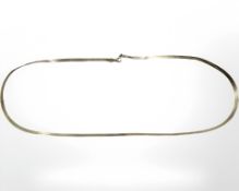 A 9ct yellow gold flat necklace, length 41 cm. CONDITION REPORT: 3.3g.