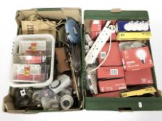 Various lightbulbs, timer plugs, vintage tape measure, hardware, extension lead, etc.