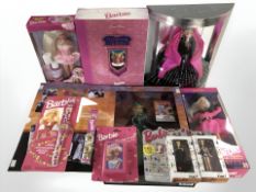 A group of Mattel Barbie dolls, keychains, etc.