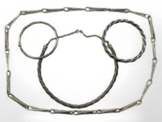 Four pieces of heavy silver jewellery, 280g.