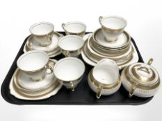 Twenty one pieces of Windsor gilt rimmed tea china.