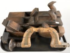 A group of antique wood planes, brace, etc.