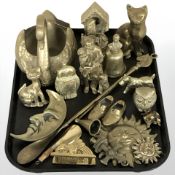 A group of brass wares including swan planter, owl and cat ornaments, bell, shoe horns, etc.