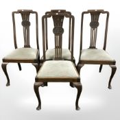 A set of four Edwardian mahogany dining chairs.