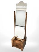 An Art Deco burr walnut sunk centre cheval mirror, fitted a drawer, height 152 cm.