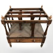 A Victorian mahogany canterbury, width 55 cm.