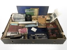 A boxwood chess set, draughts, precision drawing set, rules, stapler, cufflinks, tins, etc.