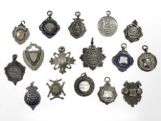 A group of silver fobs and medals, 152g gross.