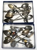 A collection of teaspoons including eleven silver examples.