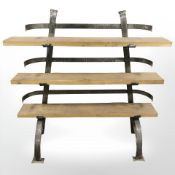 A wrought metal and pine contemporary book shelf, width 128 cm.