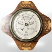 A satinwood inlaid Short & Mason barometer, width 23 cm.