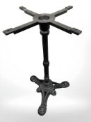 A painted cast metal table support, height 72 cm.