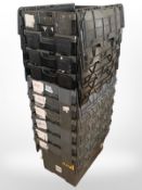 Ten heavy-duty plastic transit crates, with hinged lids, black/grey.
