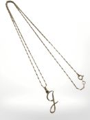 A 9ct yellow gold necklace with 9ct gold letter 'J' pendant CONDITION REPORT: 5.