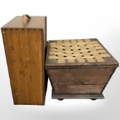 A stained pine trunk and a stool.