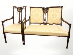 An Edwardian two seater salon settee,