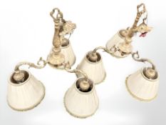 A pair of gilt metal three sconce ceiling light fixtures, height 52 cm excluding fitting.