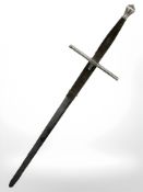 A reproduction two-handed broadsword, length 138 cm.