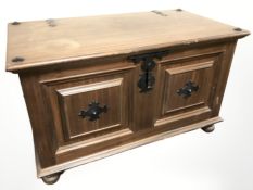 A reproduction mahogany and metal mounted blanket chest, 107 cm x 58 cm x 64 cm.